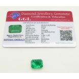 A loose emerald cut emerald measuring approximately 7.3ct