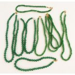 Seven emerald beaded necklaces