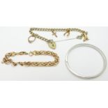 A silver gilt bracelet with four 9ct gold charms, 9ct gold bracelet and a 9ct white gold bangle,