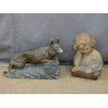 Two French Art Deco figures, one of a girl reading a book, the other of a German shepherd dog,