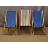 Three vintage deck chairs.