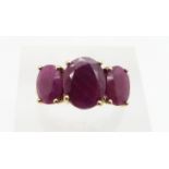 A 9ct gold ring set with three oval rubies, 3.4, size L