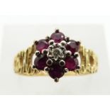 An 18ct gold ring set with rubies and a diamond in a cluster, 4.8g, size P/O