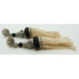 A pair of 9ct white gold Art Deco chandelier earrings set with old cut diamonds and onyx and with
