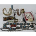 A collection of costume jewellery including bangles, necklaces etc