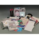 A large collection of coin presentation packs etc, mostly UK commemorative but also includes some