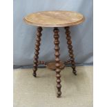 19thC mahogany cricket table with bobbin turned legs united by a small circular shelf, diameter 60cm