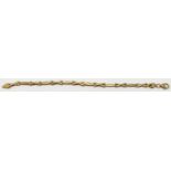 A 9ct gold bracelet made up of cross and elongated links, 6.3g