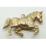 A 9ct gold horse pendant/ charm, 5g