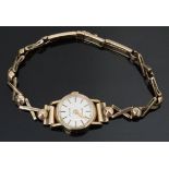 Avia 9ct gold ladies wristwatch with gold hands, two-tone baton markers, silver dial and quartz