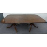 Late 19thC/20thC mahogany double D-end dining table with single leaf and four brass attachments,