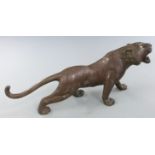 Japanese Meiji period bronze tiger, signed to base, 29 x 13cm