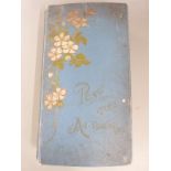 A large Edwardian postcard album containing approximately 450 cards, a wide range with topographical