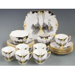 Shelley part tea set decorated in the Sunrise and Tall Trees pattern 11678, approximately 21 pieces