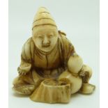 Japanese Meiji period signed ivory netsuke of a seated man with double gourd water bottle, H5.5cm