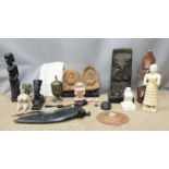 Collection of tribal figures, stone carvings, brass goblet with hardstone cabochons, enamelled