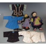 A collection of 19thC Chinese dolls clothes and two Chinese dolls