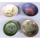 Four studio pottery bowls, two signed, maximum diameter 18cm