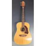 Hoyer acoustic guitar fitted with six steel strings on individual machine heads and semi round back,