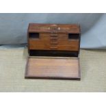 A vintage brass bound, fall flap mahogany tool chest with fitted interior and brass handle, W46