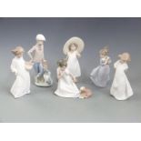 Six Nao child figures including boy with dog, tallest 23cm