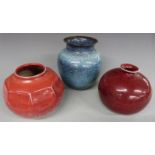 Three Koch pottery, Workum, Netherlands, vases with red and blue glazes, tallest 22.5cm