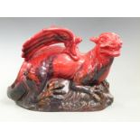 Royal Doulton veined flambé dragon with PD monogram to base, H19cm, L27cm