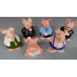 A set of Wade NatWest pigs, together with an extra Nathaniel