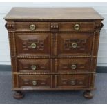 17th/18thC oak chest of four straight drawers of varying sizes with panelled and bobbin decoration