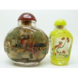 Two reverse painted glass scent bottles