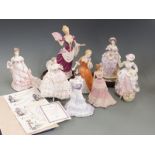 A collection of Royal Worcester, Coalport, Wedgwood and Franklin Mint figurines including The Flower