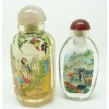 Two Chinese reverse painted glass scent bottles, one with agate stopper, 8.5cm & 8cm