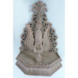 Nepalese/ Anglo Indian carved figural shelf bracket with fretwork decoration, the central figure the