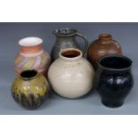 A collection of Studio pottery vases and jugs including an ash glazed vase, probably by Adam Beales,