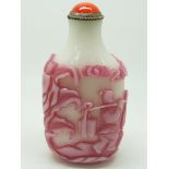 Chinese glass overlay scent bottle with decoration depicting figures and seal mark, 7.5cm tall