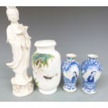 Chinese blanc de chine figure of Guanyin, Chinese pedestal vase decorated with fish and a pair of