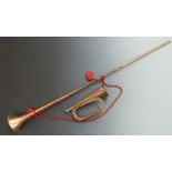 Copper and brass bugle with silvered mouthpiece together with a copper and brass coaching horn