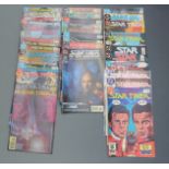 Twenty-nine DC comics Star Trek comprising 1 x3, 2, 3, 4 x3, 5 x2, 6 x2, 7, 8, 10-14, 19, 24 x2, 33,