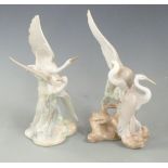 Two Nao figures of herons, tallest 27cm