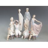 A collection of Lladro and Nao figures, tallest 38cm