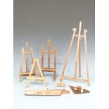 Five small table top artist's easels, tallest 58cm