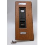 A 1950s GPO stamp machine manufactured by National Automatic Machines Ltd, 99 Cobbold Road,