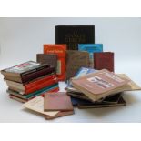 A box of stamp reference books and catalogues including early Gibbons catalogues