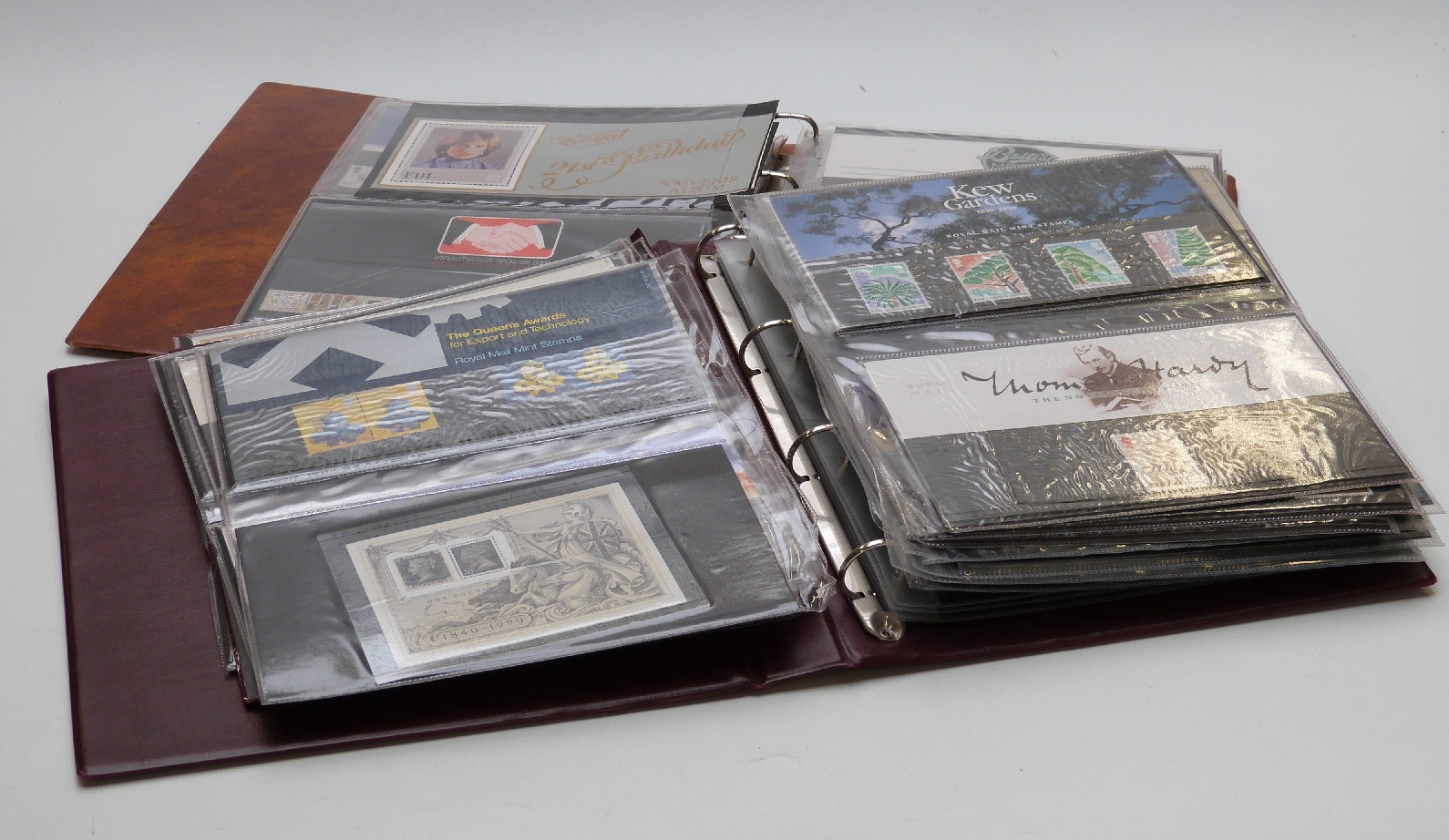 Two albums of mint stamps, definitives, presentation packs and booklets. Face value at least £300