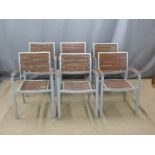 Six stackable metal garden chairs with wooden seats