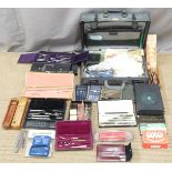 A collection of drawing equipment, calculators, rulers, slide rules etc