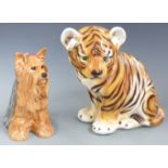 Beswick fireside Yorkshire Terrier and a Portuguese tiger cub, tallest 33cm