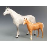 Beswick dappled grey large racehorse and a palomino, tallest 29cm