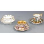 Three 19thC cabinet cups and saucers including a German/Austrian example hand decorated with flowers