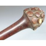 A 19thC carved ironwood Fijian Bulibuli tribal war club, the characteristic tapering domed head